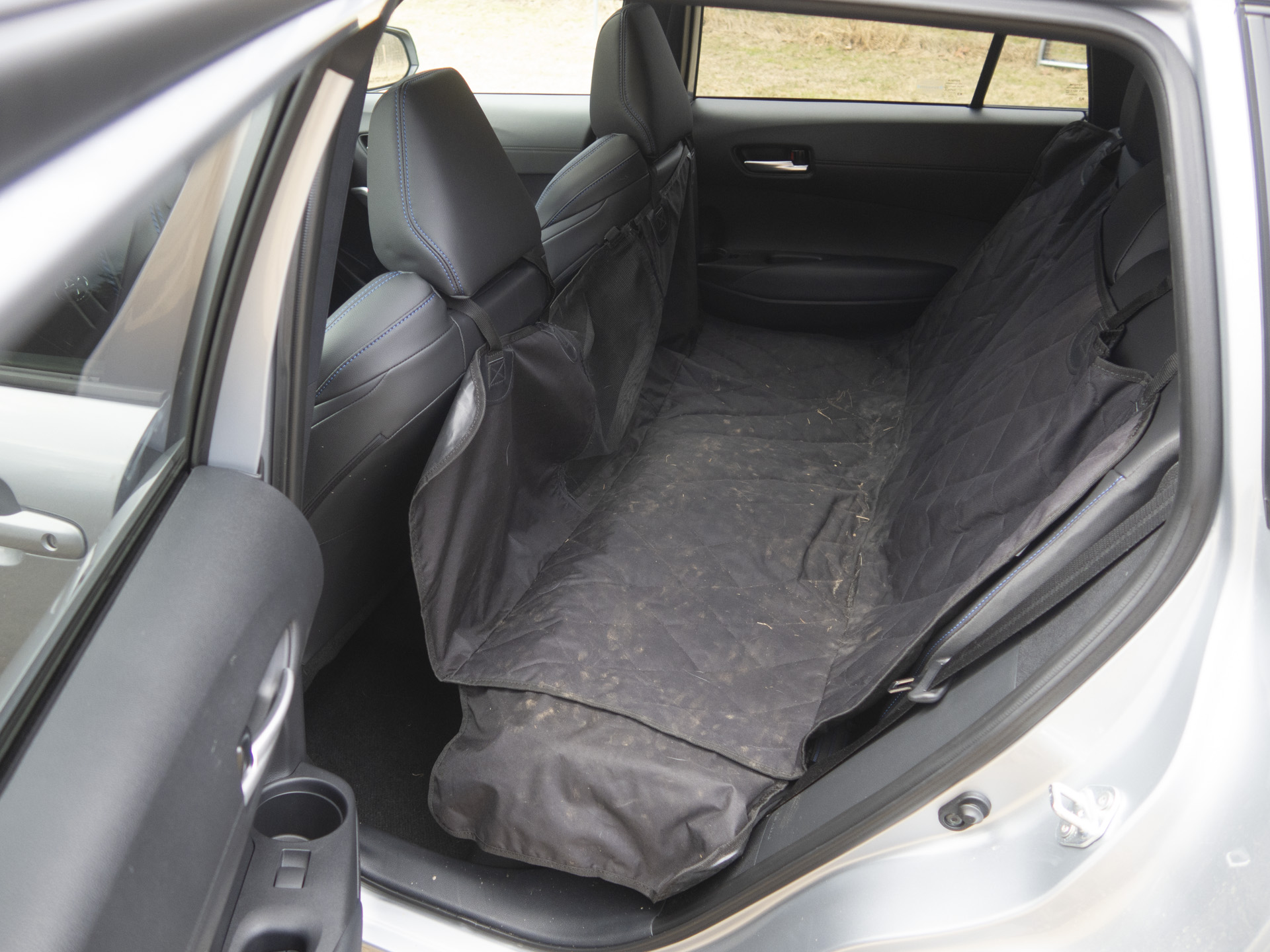 Cargo area of the 2025 Toyota Corolla Cross Cargo bay of the 2025 Toyota Corolla Cross, showing versatility for luggage and pet travel.
