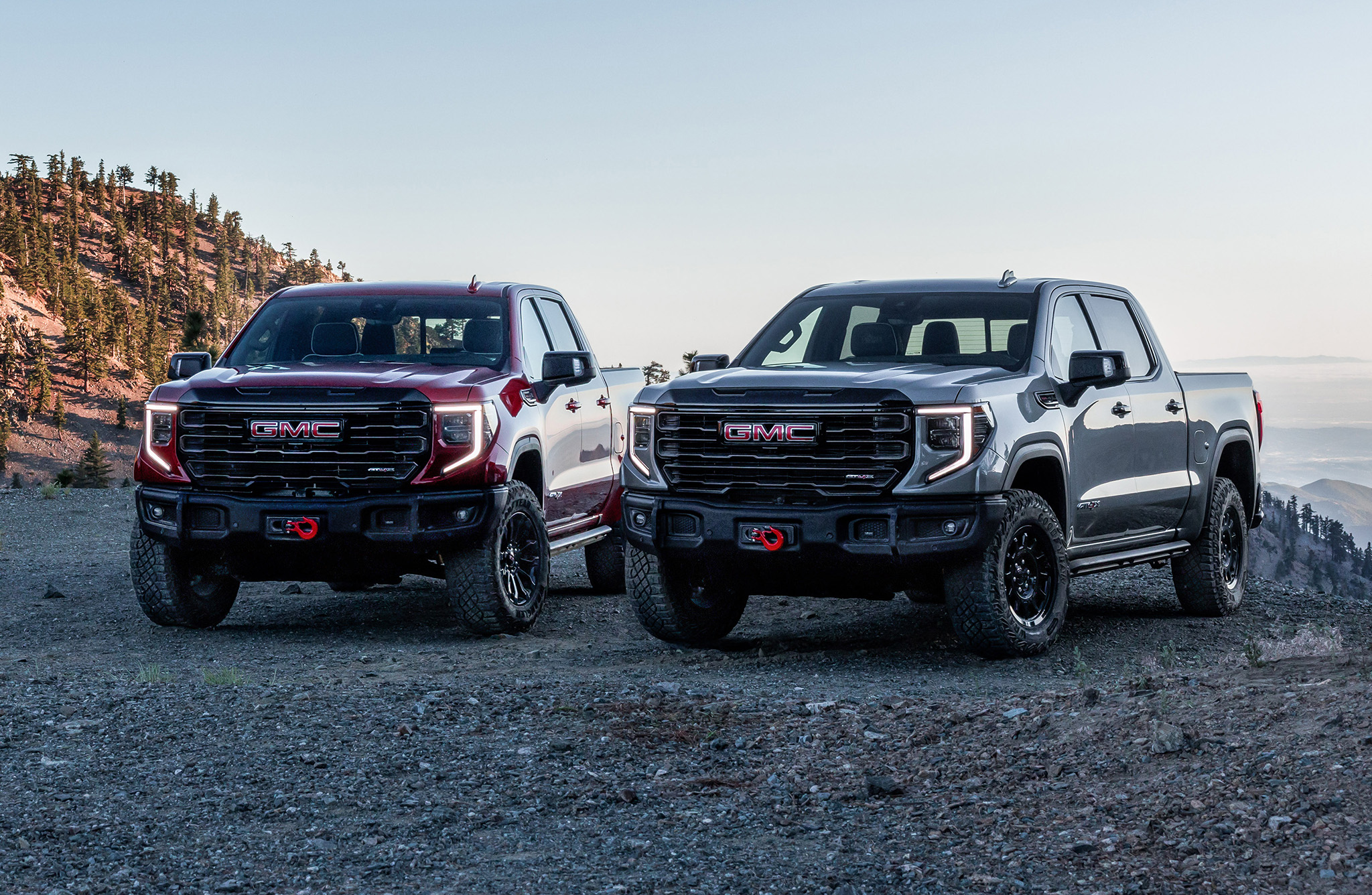 A fleet of GM trucks and SUVs parked, highlighting the impact of 6.2L V8 engine failures on fleet operations.