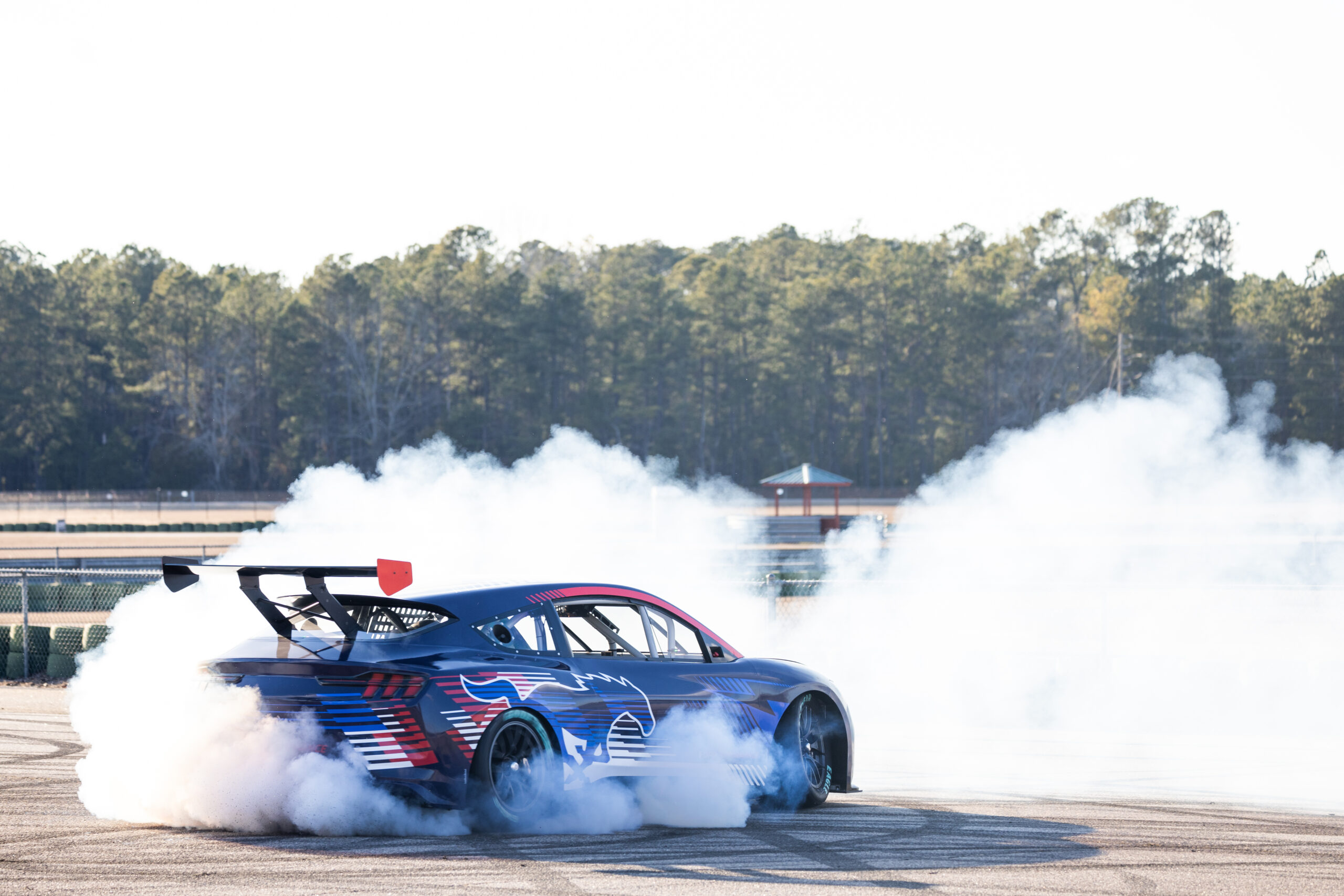 Detailed look at the 78-kWh battery, three motors, and carbon fiber tub of the Mustang Mach-E racer prototype.