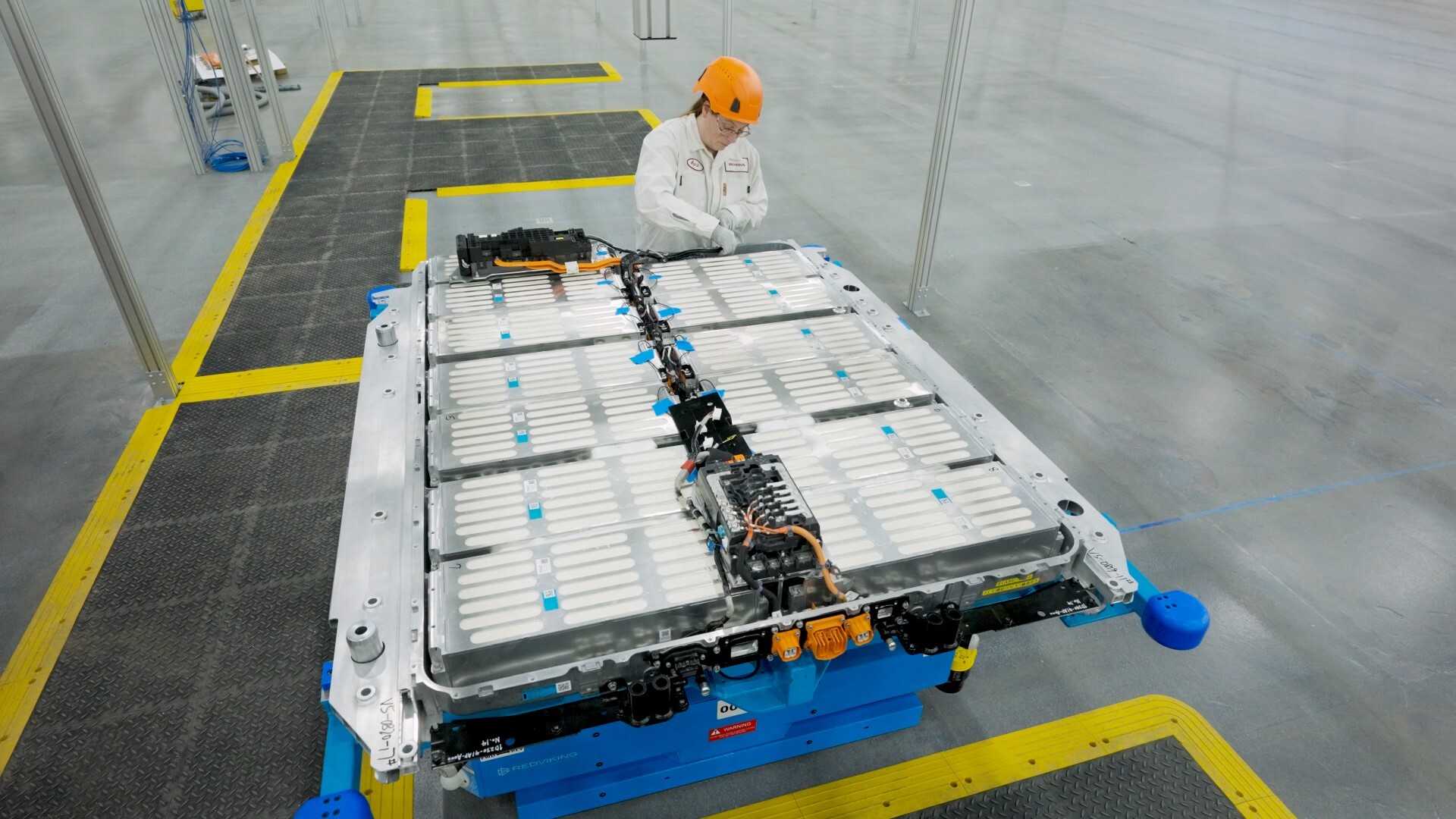 Automated Guided Vehicles navigating a factory floor at Honda's Marysville Auto Plant