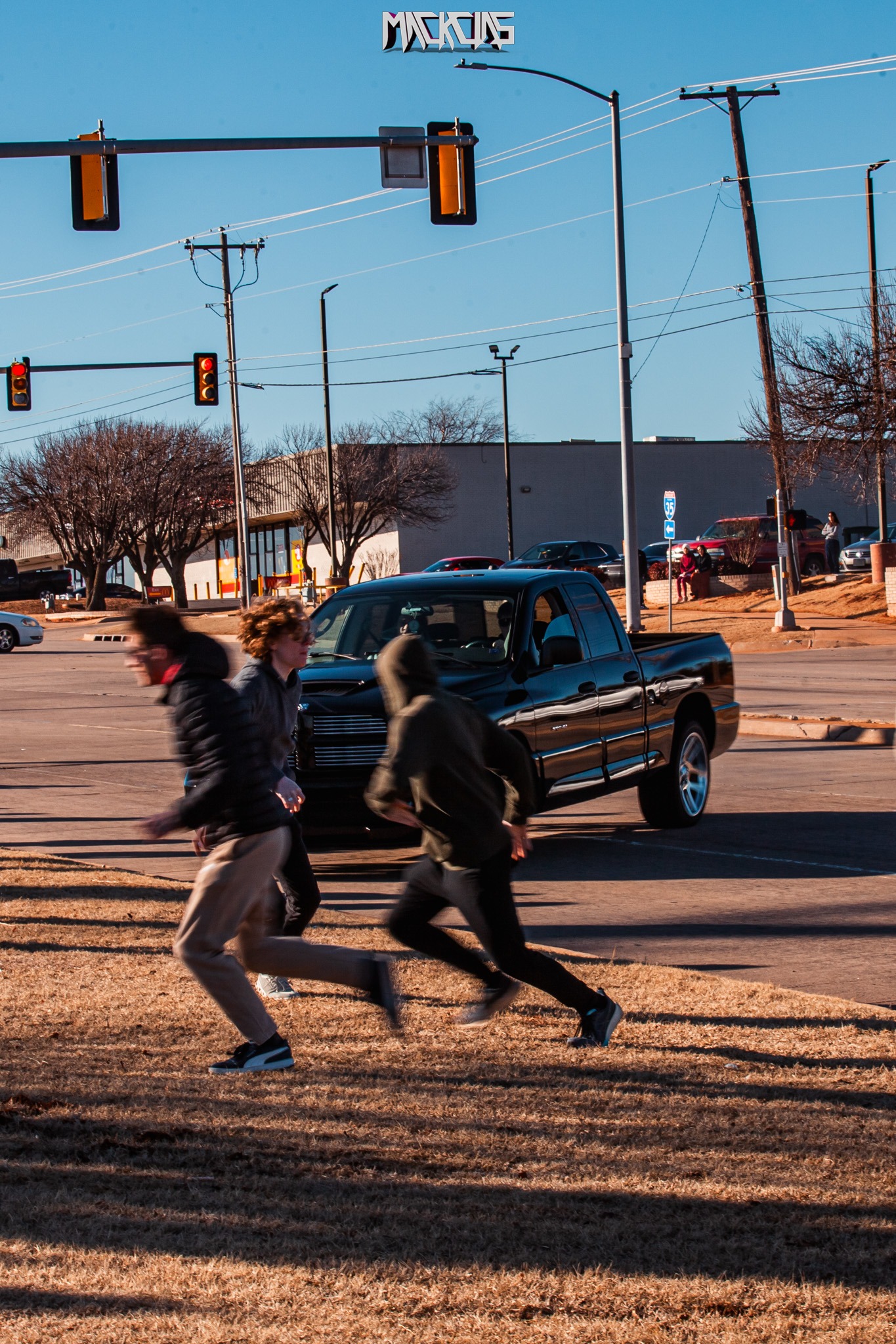 A bustling Cars and Coffee event showcasing various high-performance vehicles.