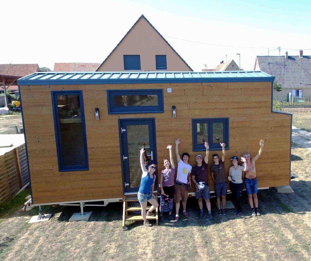 Bohemian French Tiny House with Dual-Loft Design