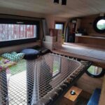 Bohemian French Tiny House with Dual-Loft Design