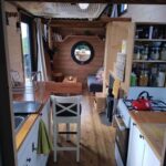 Bohemian French Tiny House with Dual-Loft Design
