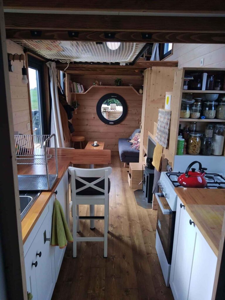 Bohemian French Tiny House with Dual-Loft Design