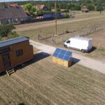 Bohemian French Tiny House with Dual-Loft Design