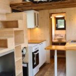 Bohemian French Tiny House with Dual-Loft Design
