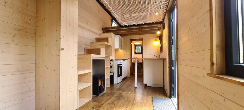 Bohemian French Tiny House with Dual-Loft Design