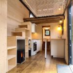 Bohemian French Tiny House with Dual-Loft Design