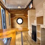 Bohemian French Tiny House with Dual-Loft Design