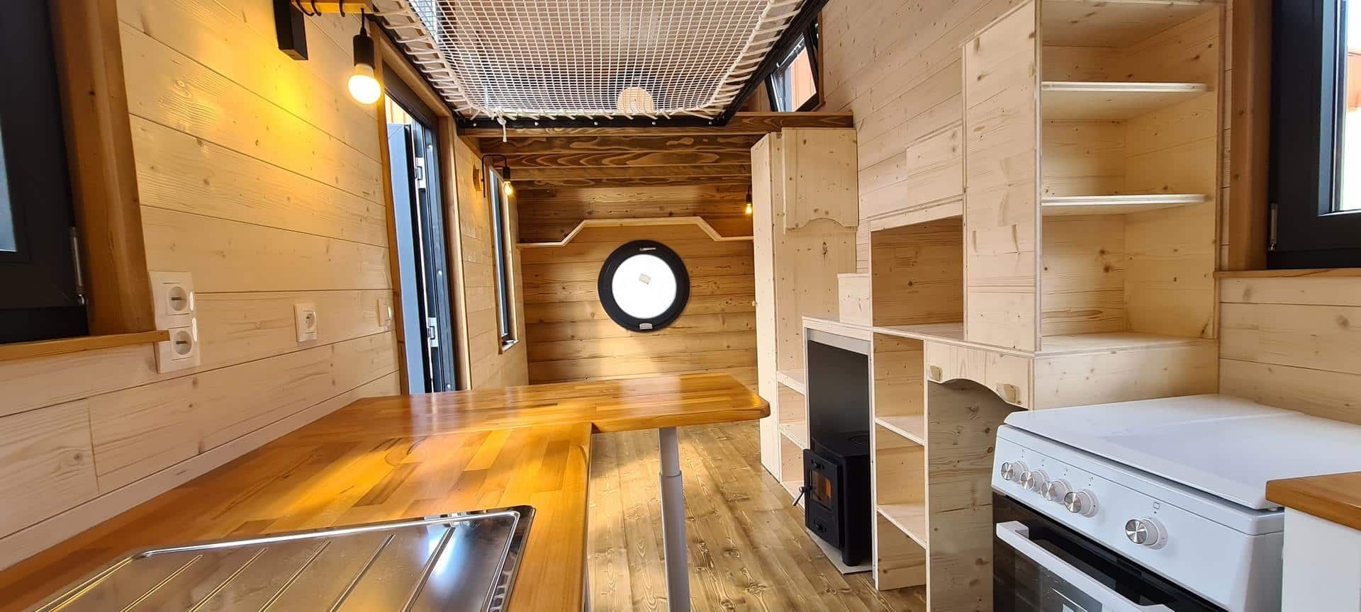 Bohemian French Tiny House with Dual-Loft Design