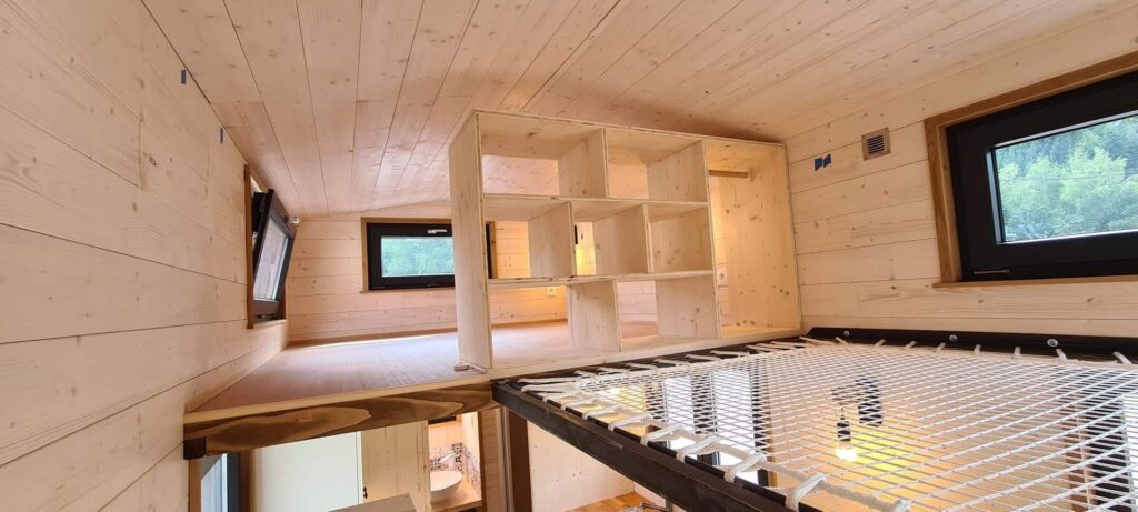 Bohemian French Tiny House with Dual-Loft Design