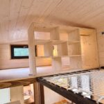 Bohemian French Tiny House with Dual-Loft Design