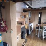 Bohemian French Tiny House with Dual-Loft Design